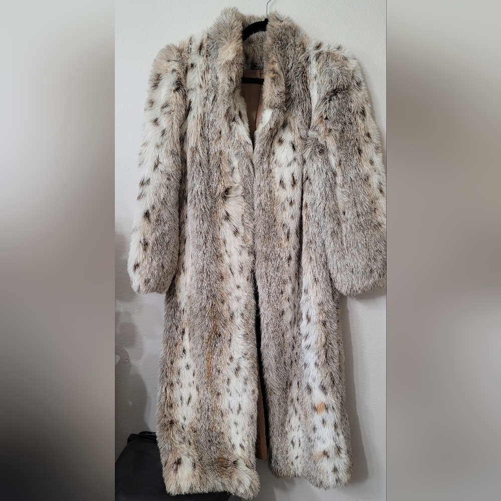 beautiful luxurious cheetah faux fur coat
